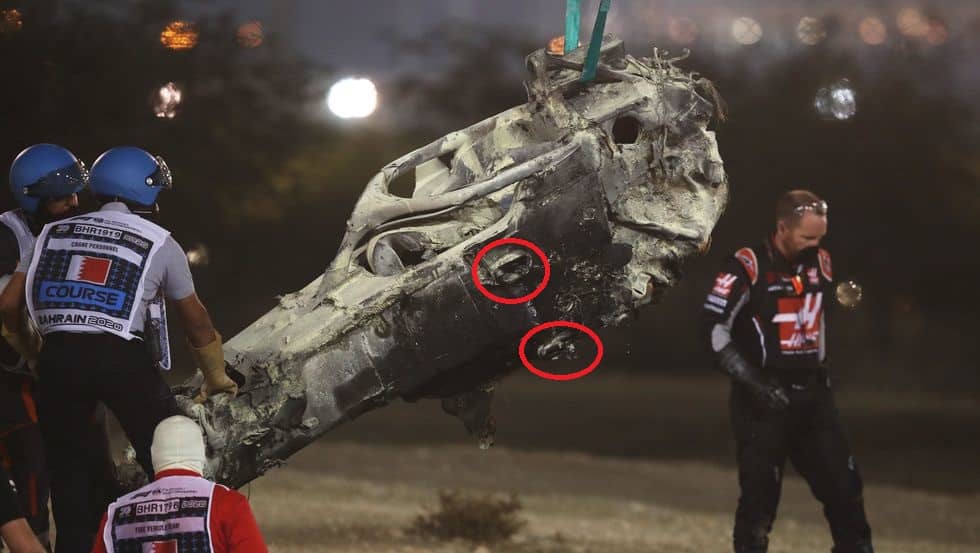 track-marshals-clear-the-debris-following-the-crash-of-news-photo-1606750886